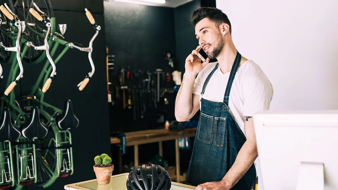 people-pay-by-link-bike-shop-with-shop-assistant